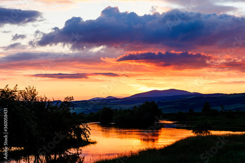 sunset on the river with beautiful sky