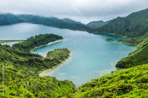 Lagoa do Fogo, a volcanic lake in Sao Miguel, Azores under the dramatic clouds