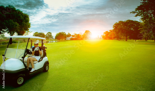 woman golfer drinking cool water in golf sport field