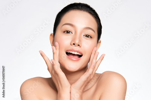Beautiful Young asian Woman touching her clean face with fresh Healthy Skin  isolated on white background  Beauty Cosmetics and Facial treatment Concept