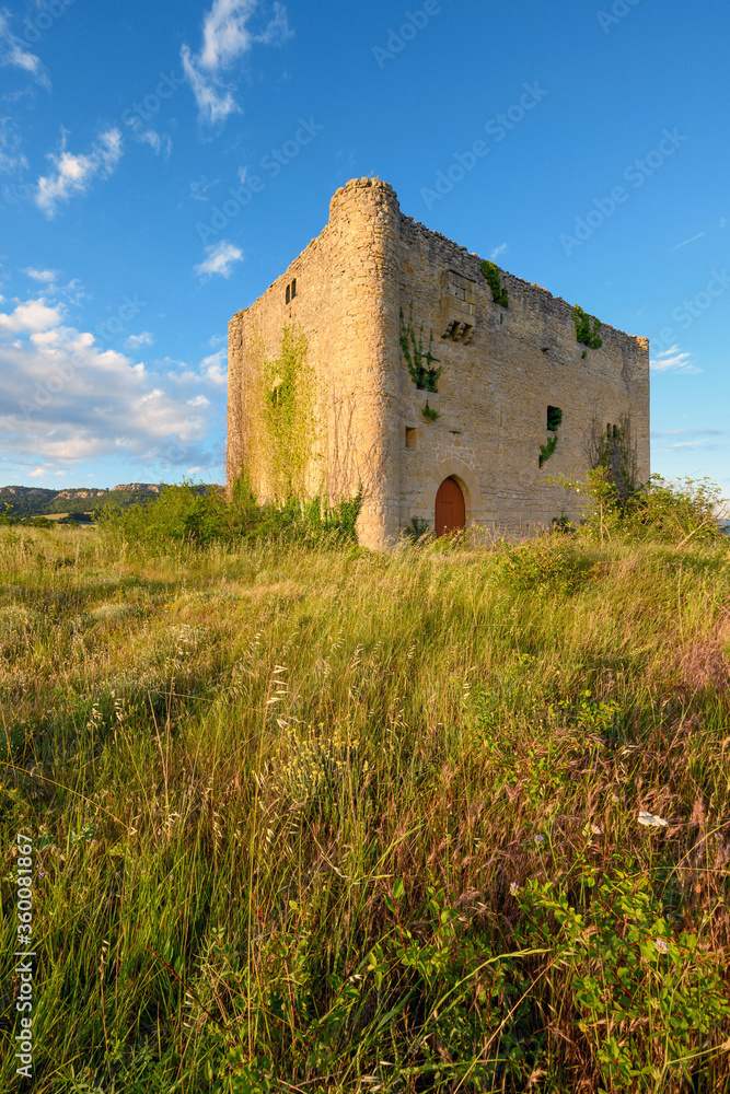 Scenic landscape of a medieval tower at sunset. High quality photo