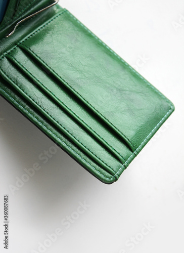 Blank green wallet isolated on white background . Open wallet . 