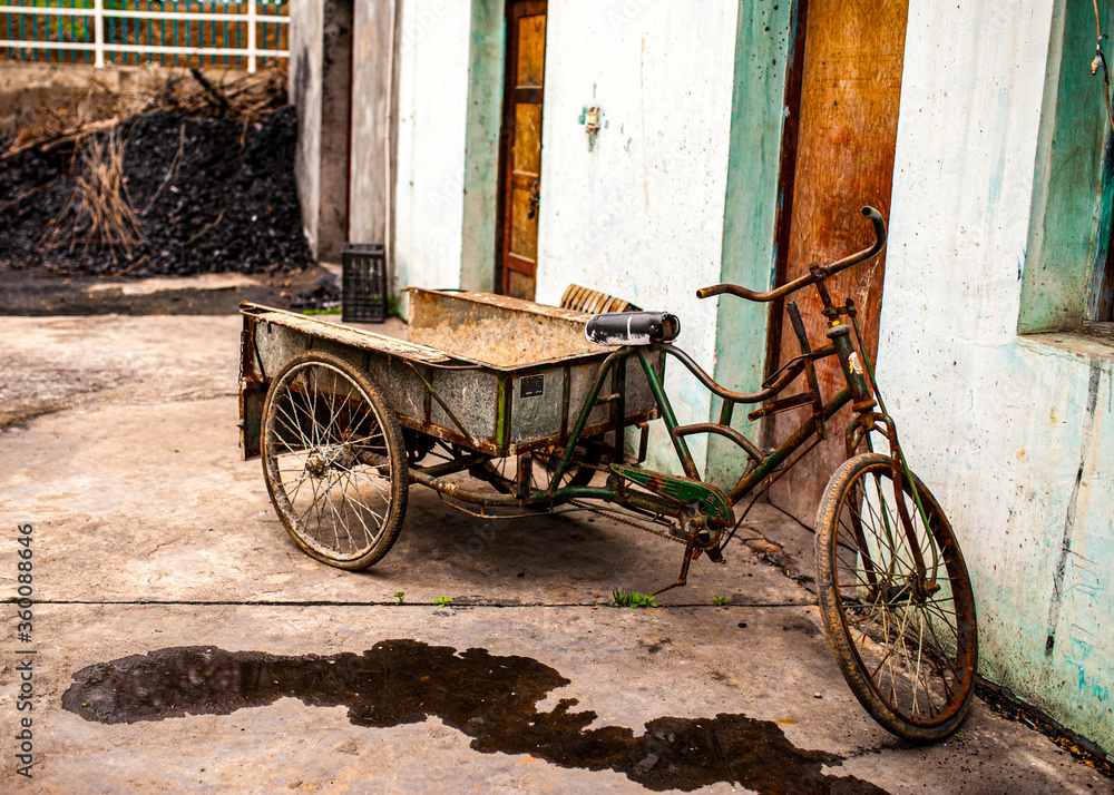 Rustic old bicycle transformed into a cart in China.