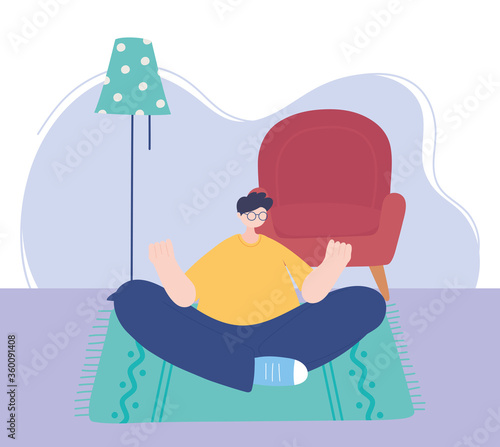 stay at home, man meditation yoga in room, self isolation, activities in quarantine for coronavirus