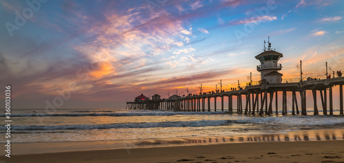 Sunset by the Huntington Beach Pier in California photo