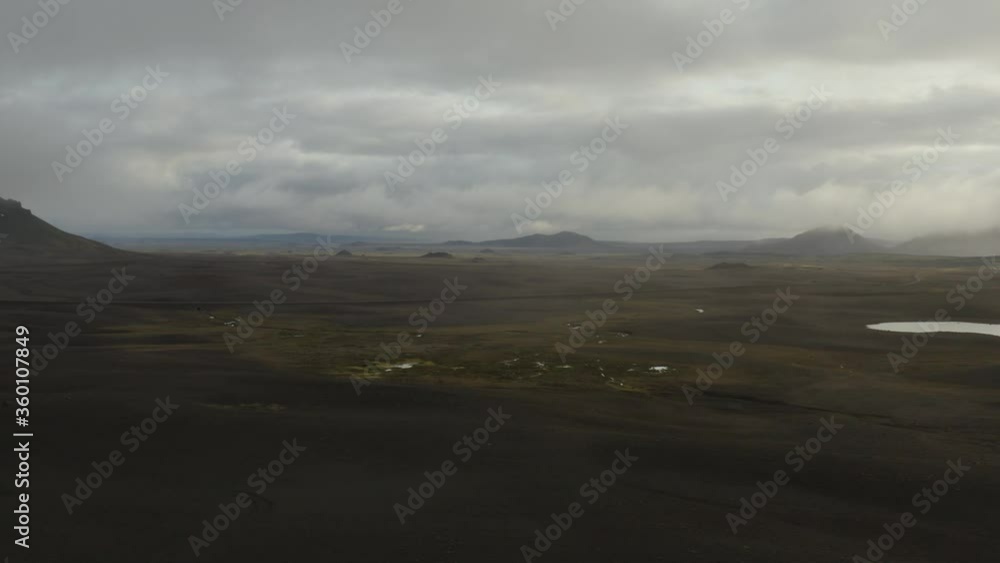 Dramatic Landscape, Lava Fields, Volcanic Rock Formation, Ring Road, Nortland, Iceland, Flying Backwards And To The Right (Camera Movement) Dramatic Landscape, Lava Fields, Volcanic Rock Formation, Ring Road, Nortland, Iceland, Flying Backwards And To The Right (Camera Movement)