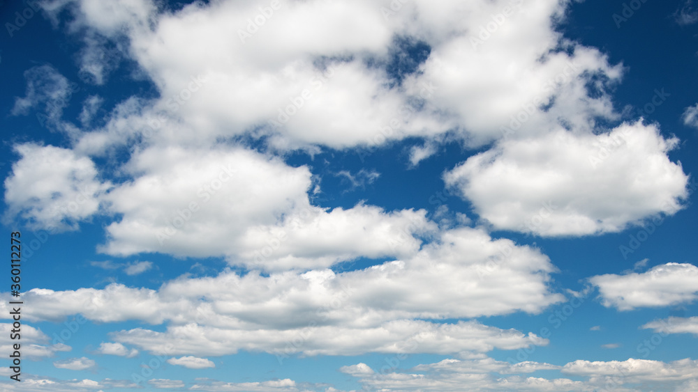 Huge blue sky and sky of clouds. Nature background. Can be used for underlay Huge blue sky and sky of clouds. Nature background. Can be used for underlay