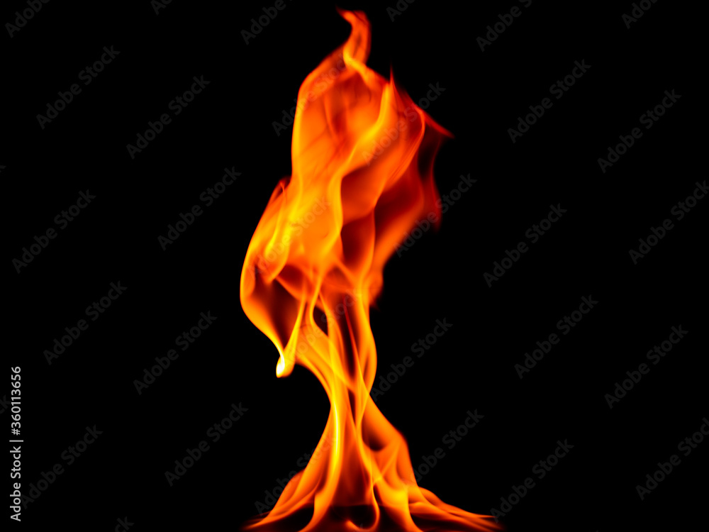 Fototapeta premium fire in the flames on black background