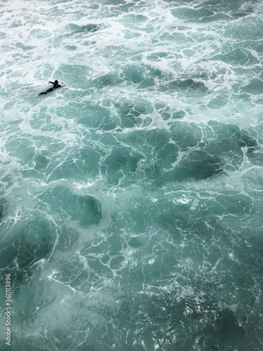 solo surfer in the water