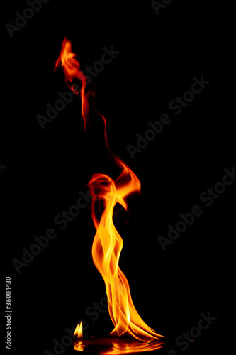 fire in the flames on black background