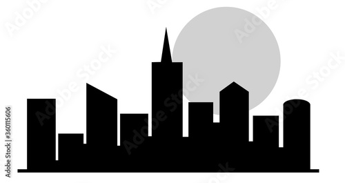 Skyscrapers and multi-storey buildings on background of sun. Sunset in the city