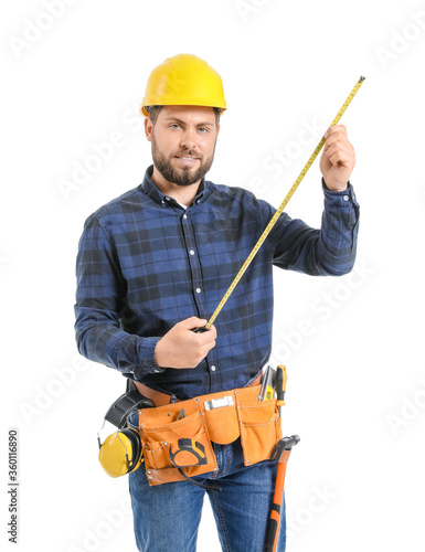 Male worker with tape measu...