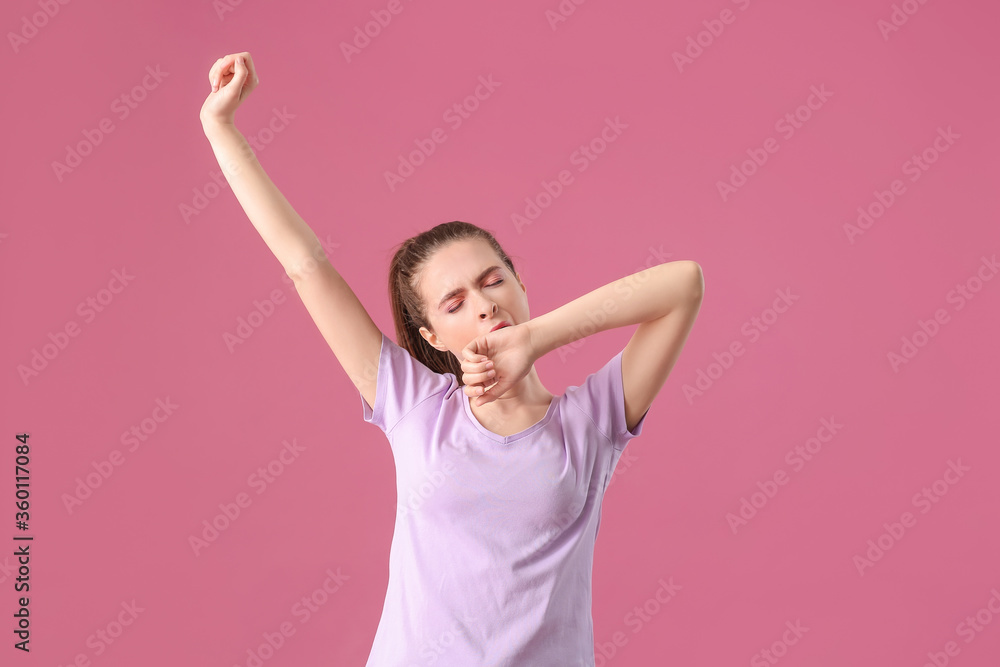 Young woman suffering from sleep deprivation on color background Young woman suffering from sleep deprivation on color background