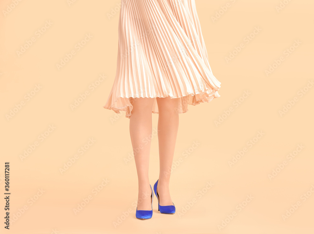 Beautiful young woman in tights on color background Beautiful young woman in tights on color background