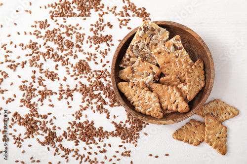 Wallpaper Mural Plate with cereal cookies and flax seeds on table Torontodigital.ca