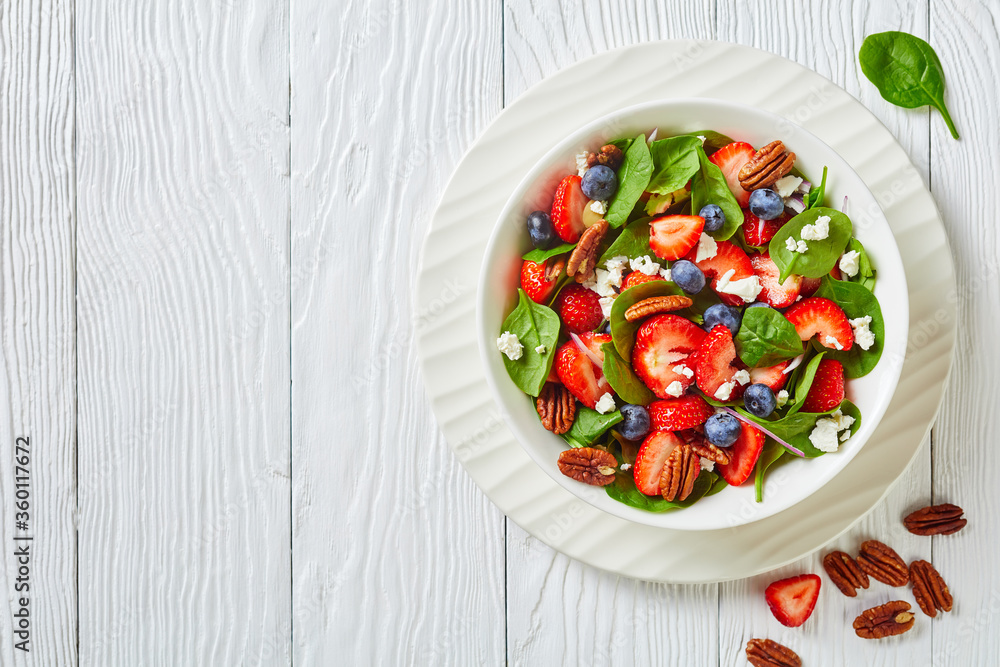 summer salad with berries, nuts, feta cheese summer salad with berries, nuts, feta cheese