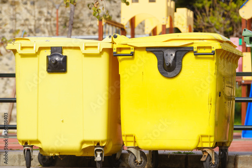 Industrial big garbage bins outdoors © Voyagerix