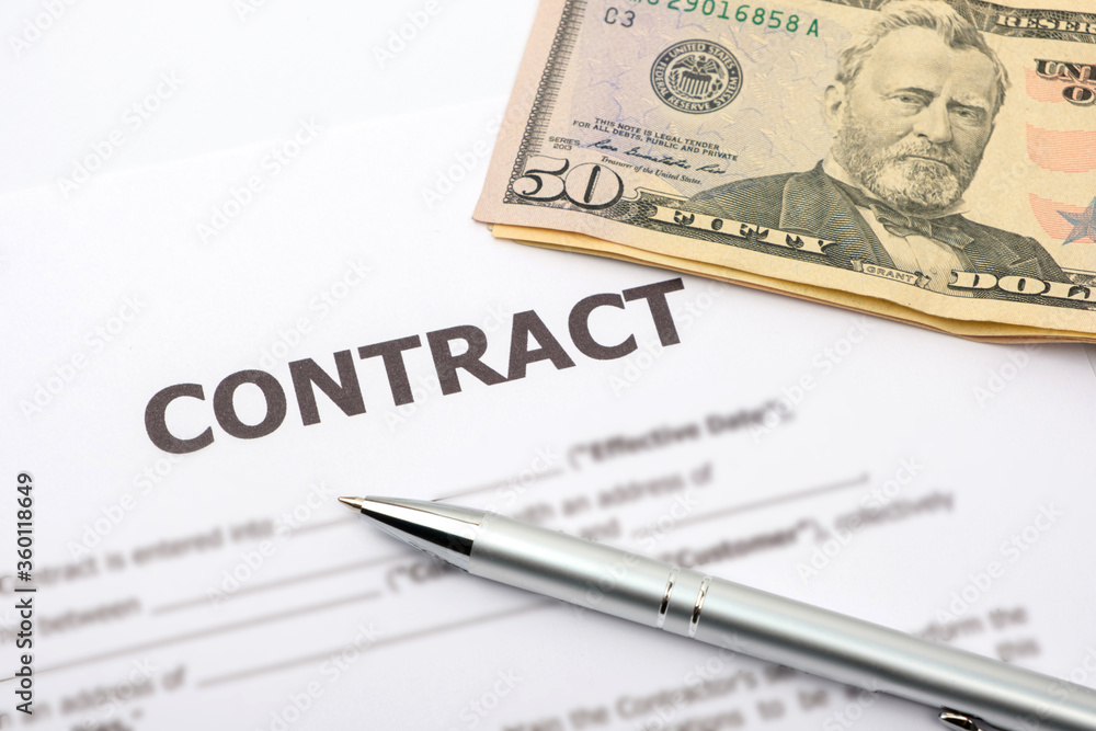 Pen, dollar and contract. Profitable business contract concept.