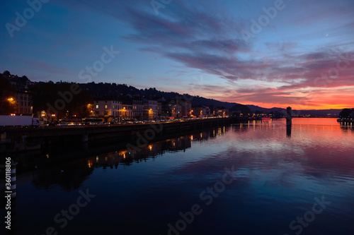 Amazing red sunset and Rhone river in Vienne, France © Алексей Сыркин