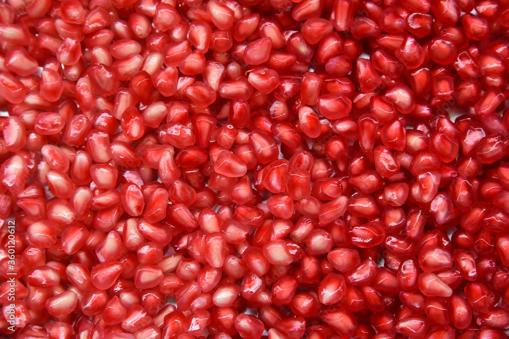 pomegranate seeds close up shot in natural light. pomegranate seeds close up shot in natural light.