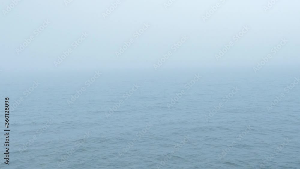 foggy beach and wave foggy beach and wave