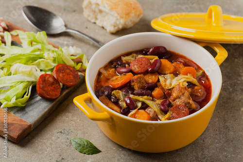 Traditional portuguese goulash with cabbage, beans and ribs.