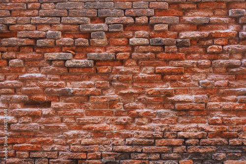 photo of red brick wall texture background