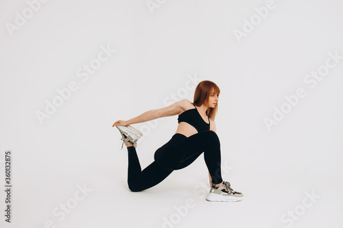 Athletic fitness woman helthy sport isolated white background black clothes
