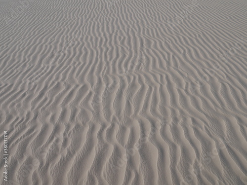 white sand ripples in the desert