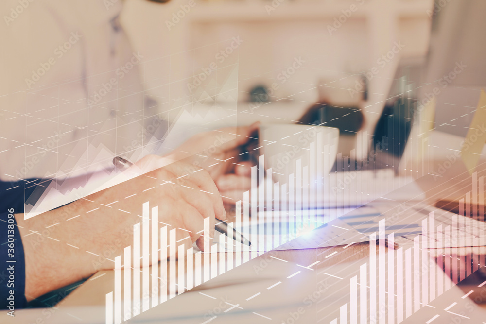 Double exposure hands with stock market chart. Double exposure hands with stock market chart.
