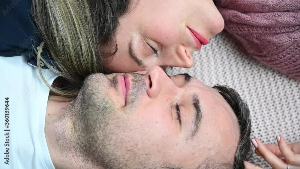 Happy couple smiling face to face, top view Happy couple smiling face to face, top view