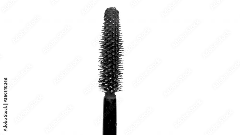 black mascara moving around on white background black mascara moving around on white background