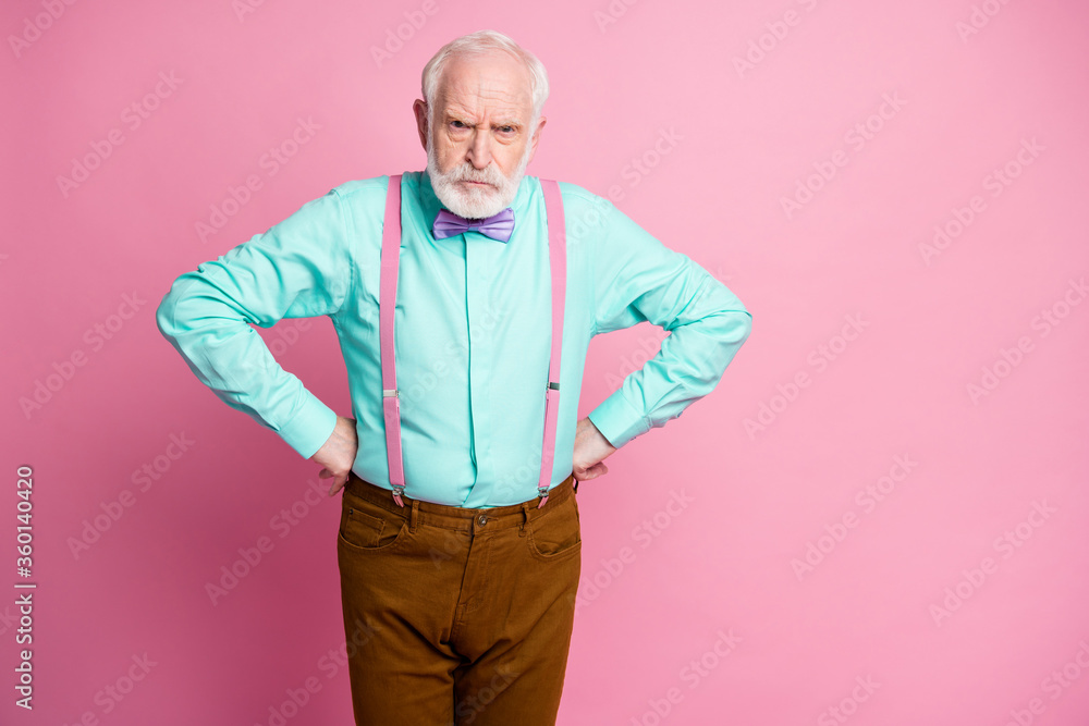 Photo of crazy mad aged man hands by sides angry grimace blaming children for spoiling furniture wear mint shirt suspenders bow tie trousers isolated pink pastel background Photo of crazy mad aged man hands by sides angry grimace blaming children for spoiling furniture wear mint shirt suspenders bow tie trousers isolated pink pastel background