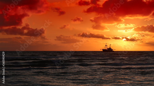 fishing boat in the sunset
