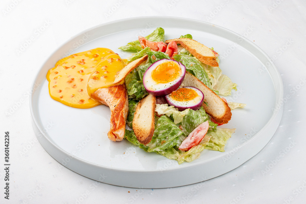 Turkey fillet with vegetables, egg and red caviar sauce Turkey fillet with vegetables, egg and red caviar sauce