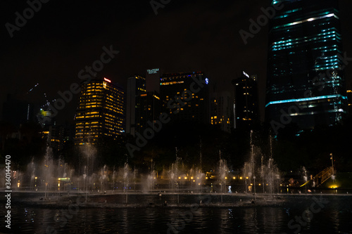 Night view of the dancing multi-colored fountains. Show of Singing Fountains