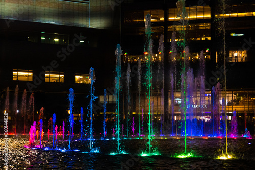Night view of the dancing multi-colored fountains. Show of Singing Fountains photo