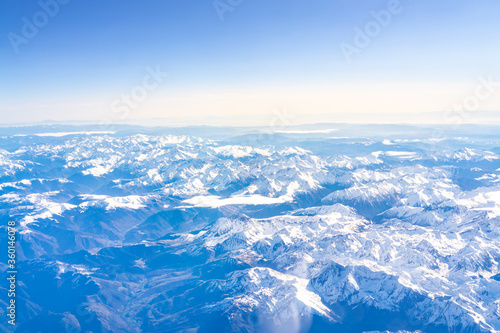 Flight over the snow capped mountains of the Pyrenees