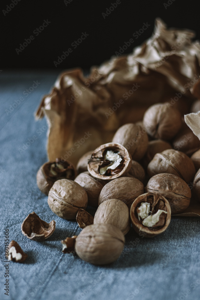 Walnuts on the table in craft bag Walnuts on the table in craft bag