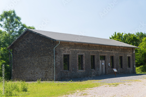 Die ehemalige Dorfschule im verlassenen Dorf Wollseifen bei Vogelsang in der Eifel photo