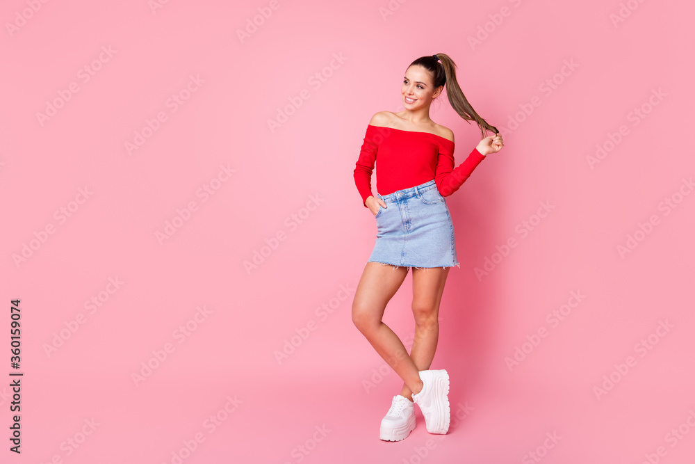 Full size photo of attractive lady slim shape coquette look empty space see handsome guy wear casual red open shoulders shirt mini denim skirt footwear isolated pastel pink color background Full size photo of attractive lady slim shape coquette look empty space see handsome guy wear casual red open shoulders shirt mini denim skirt footwear isolated pastel pink color background