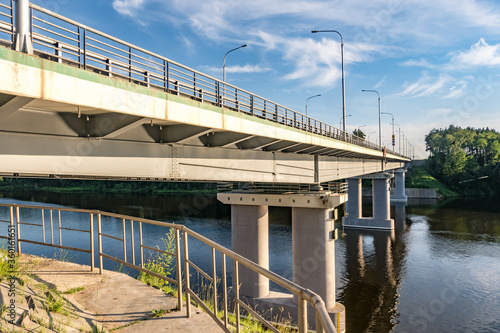 car bridge across the wide river