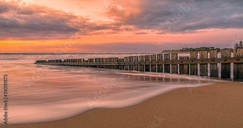 Sunrise on Torquay beach, Surf Coast, Victoria, Australia featuring the wooden groyne © Andrew