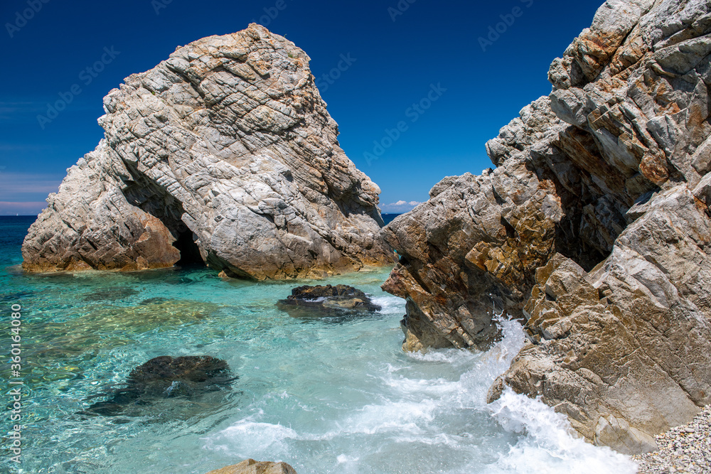 Amazing rocks over the crystal clear waters in Elba Island, Italy. Sansone Beach