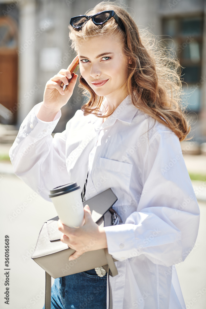 girl talks on her phone