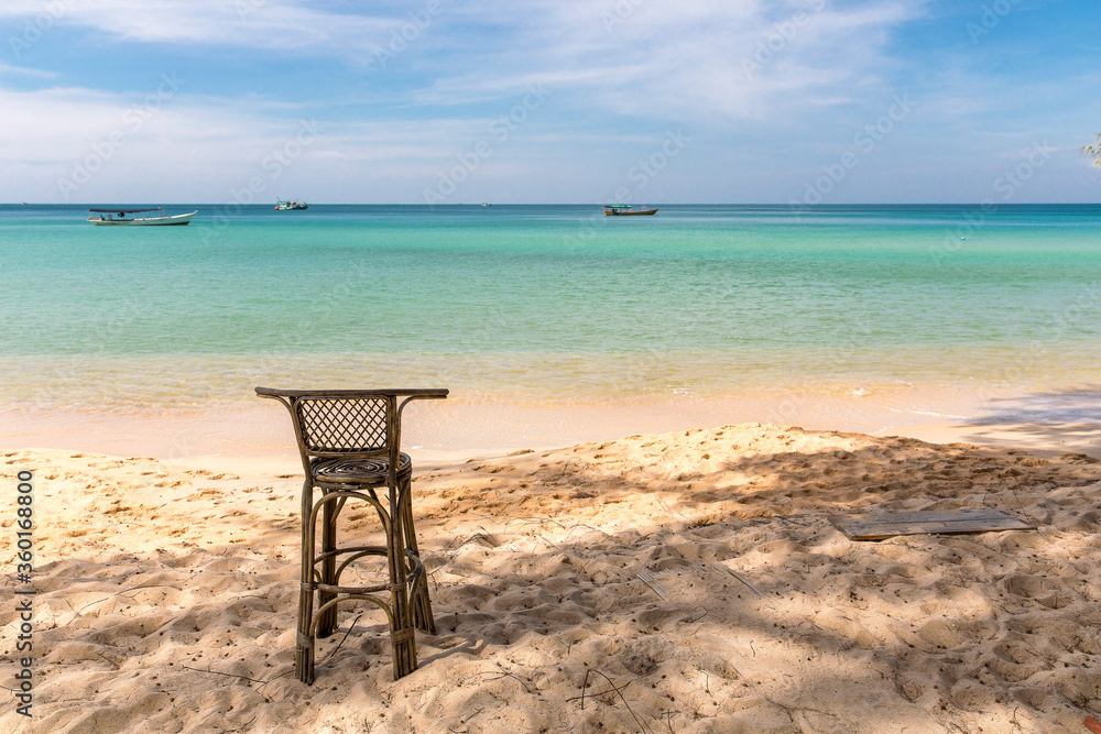 Bamboo Chair and Boat, Sunset beach, Koh Rong Samloem island, Sihanoukville, Cambodia. Bamboo Chair and Boat, Sunset beach, Koh Rong Samloem island, Sihanoukville, Cambodia.