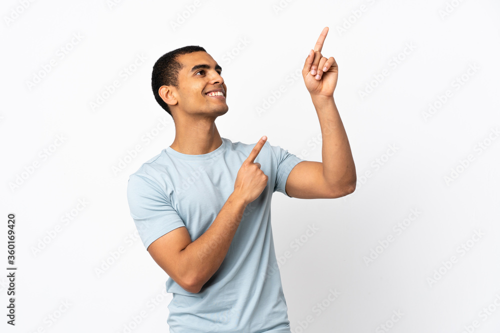 African American man over isolated white background pointing with the index finger a great idea