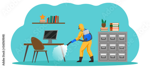 An employee in a chemical protection suit with a cold mist generator performs sanitary treatment. Disinfection of office during an outbreak of coronavirus. 