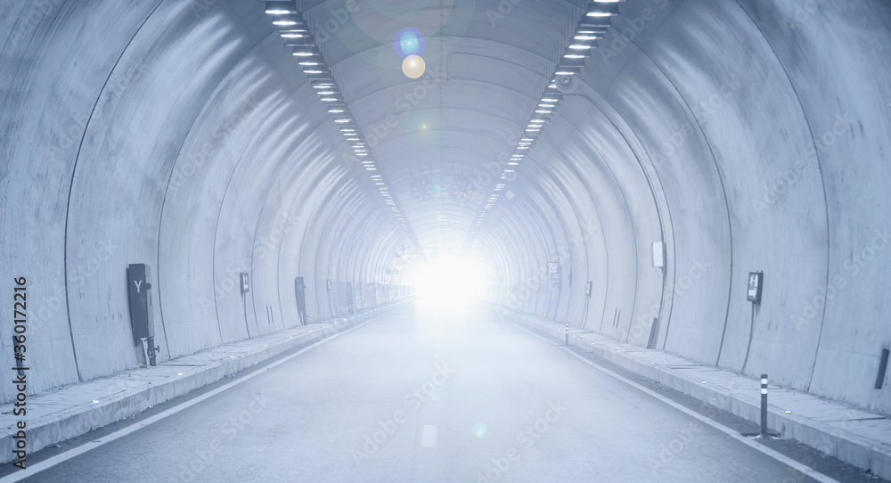 Highway road tunnel with car light Highway road tunnel with car light