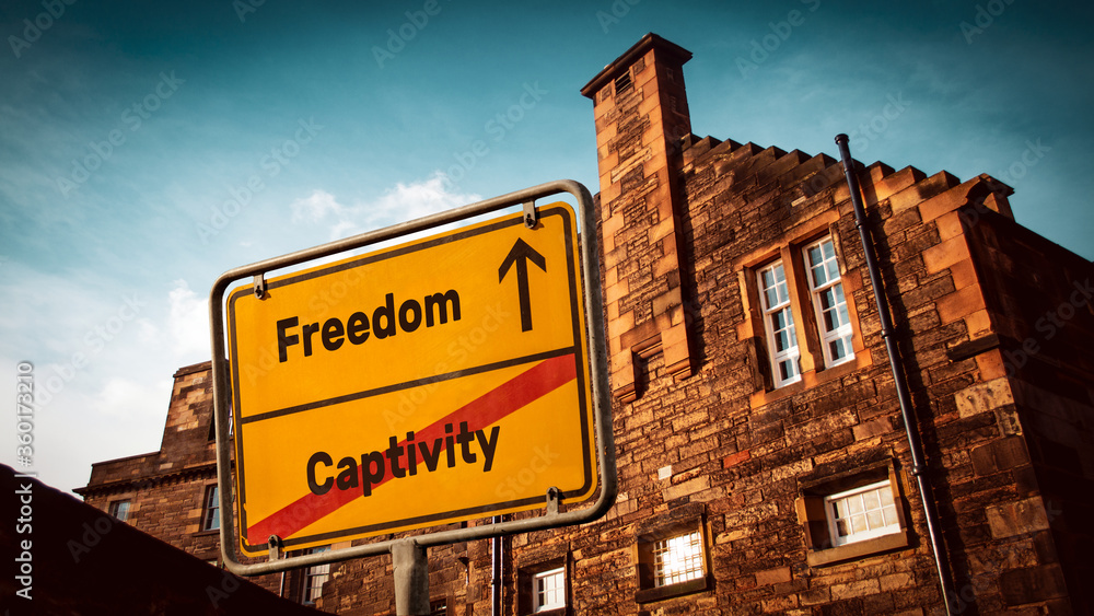 Fototapeta premium Street Sign to Freedom versus Captivity